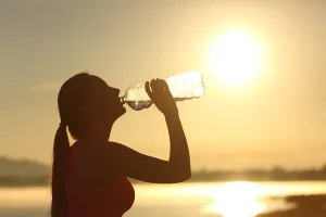 depositphotos_84689058-stock-photo-fitness-woman-silhouette-drinking-water