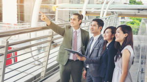 business-teamwork-with-document-her-hands-watching-some-interesting-content-lunch-break_wp